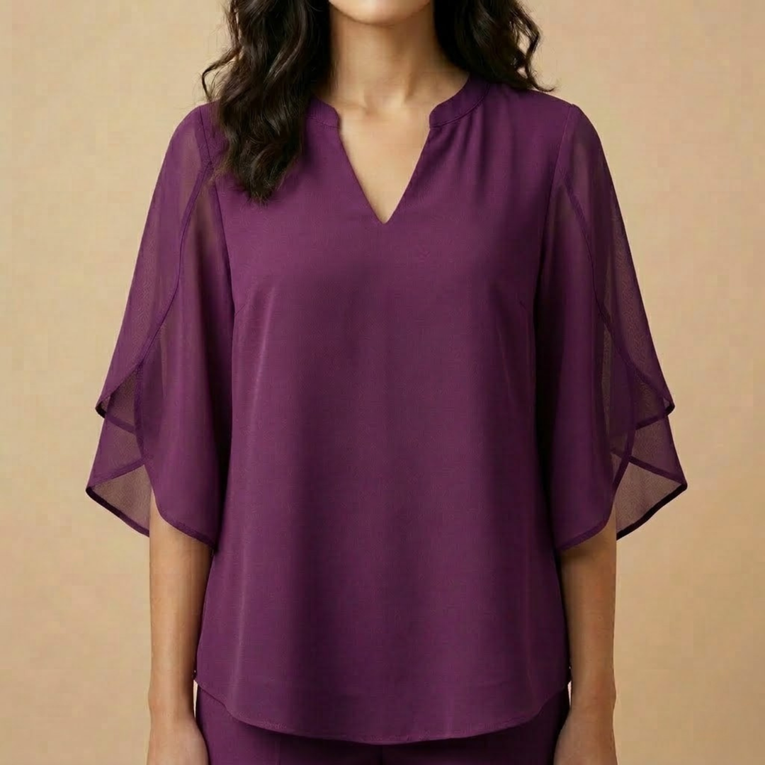 Claudia – Blouse en mousseline de chiffon à col en V.