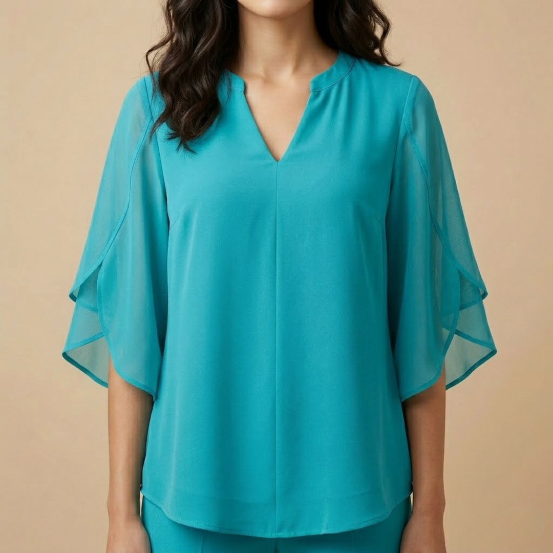 Claudia – Blouse en mousseline de chiffon à col en V.
